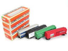 Lionel Trains 6-19803, 6-16245, 6-16258, & 6-2919 Box Car 4 Pack, O Gauge picture