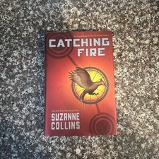 Catching Fire by Suzanne Collins 1st edition print 2009 Hunger Games Hard Cover picture