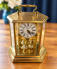 Vintage Bulova Anniversary Clock Gold Brass Glass Roman Numeral Mantel Clock picture