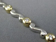 ESTATE .70CT DIAMOND 14KT WHITE & YELLOW GOLD ETOILE WAVE TENNIS BRACELET #5139 picture