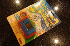 Vintage PLAYTIME GRAND PRIX   Handheld Electronic Tabletop Video game  D6 SEALED picture