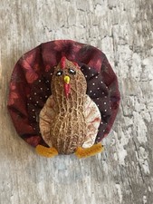 handcrafted country-style turkey brooch (pin) that utilizes folk-art materials picture