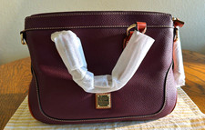 Dooney & Bourke 100% Leather, leather tassels, leather long Strap. Reg Card. picture