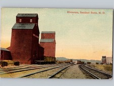 c1915 Grain Elevators Railroad SENTINEL BUTTE North Dakota ND Postcard picture