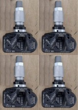 Brand New Set of Four (4) OEM Genuine BMW TPMS 36106887147 picture