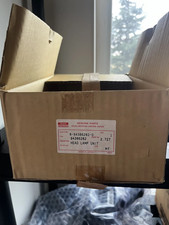 Isuzu Trooper NOS Driver Side Headlight P/N 8943862820 picture
