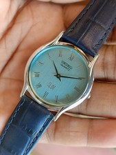 VINTAGE SEIKO SLIM QUARTZ SKY BLUE DIAL JAPAN MEN'S WORKING DRESS WATCH picture