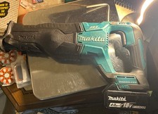 Makita ￼XRJ05 reciprocating saw tool  And Battery  No Charger Untested picture