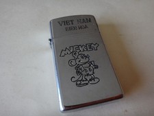 Year 1981 Zippo Slim Lighter VIETNAM BIEN HOA, MICKEY MOUSE and Iconic Phrase picture