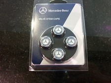 OEM GENUINE MERCEDES BENZ VALVE STEM CAPS WITH MB STAR AND LAUREL SET OF 4 picture