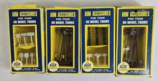 Vintage AHM HO Scale Model Train Accessories Lot Of 4 New Old Stock Signs Poles picture