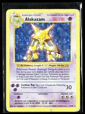 1999 Pokemon Base Set Alakazam 1/102 Holo Rare Shadowless WOTC Vintage HeavyPlay picture