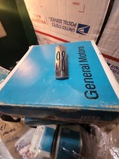 NOS 1971-76 Oldsmobile Regency 98 Tail Light Lens Ornament Emblem 5967508AC picture