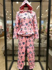 Adorable two-piece pajama set in a soft pink color featuring a charming Minnie M picture