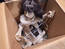 Spirit Halloween Animated Animatronic Life Size Zombie Swing Girl Prop picture