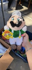 This is a vintage 1988 ACME Nintendo Super Mario Bros. Luigi plush toy picture