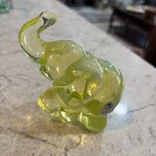 Vintage Fenton Vaseline Uranium Opalescent Glass Trunk Up Elephant. With label. picture