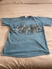 a vintage 1990s all-over print (AOP) wolf pack t-shirt picture