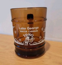 LAKE GEORGE  WINTER CARNIVAL   1980  Amber Glass Anchor Hocking Souvenir Mug picture