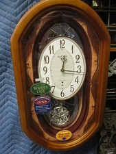 rhythm clock SSS serenade small world rhythm magic motion clock 4mj887 picture