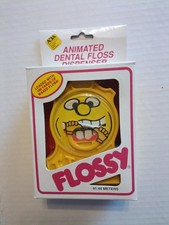 Vintage Flossy Animated Dental Floss Dispenser - New In Box Sealed - Novelty picture