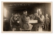 Vintage RPPC Meal Time At The W.C. Co Photo Postcard Interior Dining Men Eating picture
