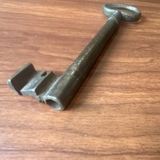 Large antique metal skeleton key with oval bow, old-style vintage key picture