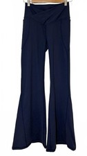 NWT Fabletics PureLuxe Flared Leggings Navy Blue Pockets sz Small picture