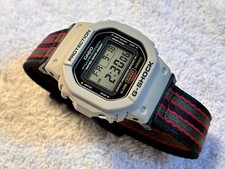 Casio G-Shock DW-5600E - Grey Bezel with Nylon Straps - Module 3229 -New Battery picture
