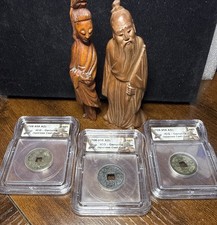 3 Genuine Japanese Cash Coins & Two Carved Wooden Figures.  picture