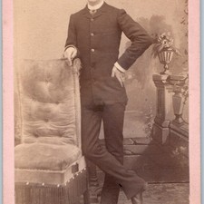 c1870s CDV Photo Card Handsome Young Man Cigar Slim Fit Suit Hat Fringed Chair picture