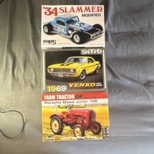 3 Opened Model Kits, RevelleTractor, AMt34’slammer, 1969Yenko Kit Never Started picture