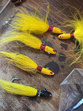 Vintage bucktail and feather jigs with handpainted heads.  picture