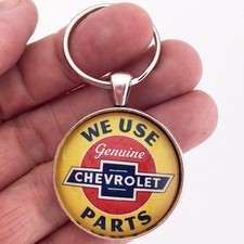 Vintage We Use Genuine Chevrolet Parts Sign Chevy bowtie Keychain Reproduction picture