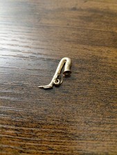 Vintage 14kt gold saxophone charm picture