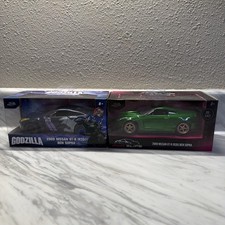 Jada Toys 1:32 2009 Nissan GT-R R35 Pink Slips Green + Godzilla Hollywood Rides picture