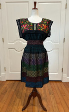 Mexican Paloma dress made of handwoven fabric with 100 % handmade embroidery. picture