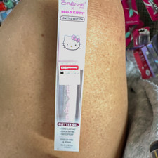 The Crème Shop x Hello Kitty Glitter Gel Lip Gloss Cyberberry 0.16 fl oz picture