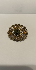 Vintage Made In Austria Golden Rhinestone Brooch w/Orange, tan and brown stones picture